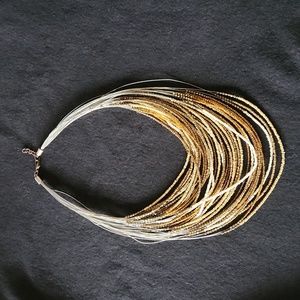Multi string beaded necklace